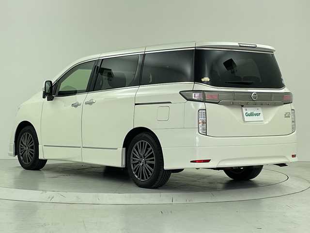 日産 エルグランド 250HWS アーバンクロム 大阪府 2017(平29)年 2.1万km ブリリアントホワイトパール フリップダウンモニター/純正メモリナビ/　　CD/DVD/BT/バックカメラ/両側パワースライドドア/クルーズコントロール/合皮ハーフレザーシート/オットマン/LEDオートライト/フォグランプ/純正18インチアルミホイール/スマートキー/ビルトインETC