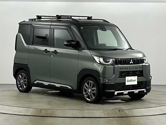 三菱 デリカミニ T プレミアム 愛知県 2023(令5)年 1.2万km ＤグリーンⅡ ワンオーナー/禁煙車/純正9インチディスプレイオーディオ/（AｐｐleCａｒPｌａｙ/AndroidAuto/Bluetooth/HDMI)/全方位カメラ/三菱e-Assist/・マイパイロット/・衝突軽減ブレーキ/・車線逸脱警報システム/・オートマチックハイビーム/追従式クルーズコントロール/ETC/両側パワースライドドア/シートヒーター/ステアリングヒーター/ヒルダウンアシスト/アイドリングストップ/スマートキー/プッシュスタート/ルーフレール/LEDヘッドライト/純正15インチアルミホイール/純正フロアマット