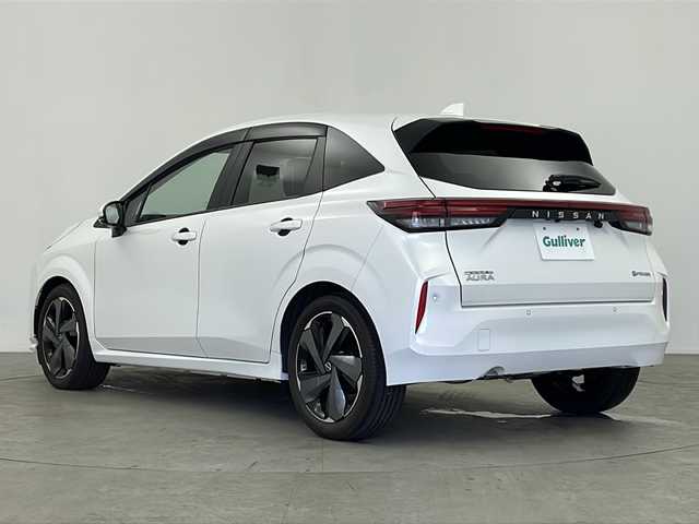 日産 オーラ G レザーエディション 鹿児島県 2022(令4)年 1.8万km ピュアホワイトパール 純正ナビ/（BT/フルセグTV）/エマージェンシーブレーキ/プロパイロット/BOSEプレミアムサウンド/アラウンドビューモニター/電動パーキングブレーキ/オートホールド機能/ワイヤレス充電/レザーシート/ブラインドスポットモニター/デジタルインナーミラー/革巻きステアリング/ステアリングスイッチ