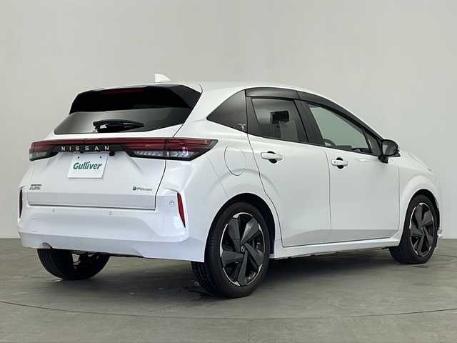 日産 オーラ G レザーエディション 鹿児島県 2022(令4)年 1.8万km ピュアホワイトパール 純正ナビ/（BT/フルセグTV）/エマージェンシーブレーキ/プロパイロット/BOSEプレミアムサウンド/アラウンドビューモニター/電動パーキングブレーキ/オートホールド機能/ワイヤレス充電/レザーシート/ブラインドスポットモニター/デジタルインナーミラー/革巻きステアリング/ステアリングスイッチ