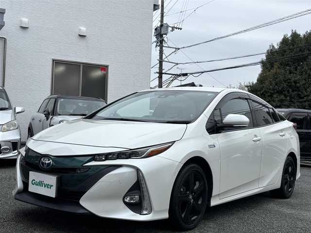 トヨタ プリウス ＰＨＶ A レザーパッケージ 熊本県 2018(平30)年 3.3万km ホワイトパールクリスタルシャイン 純正11.6インチナビ/【フルセグTV/Bluetooth再生/CD/DVD】/バックカメラ/レーダークルーズコントロール/レーンディパーチャーアラート/プリクラッシュセーフティ/クリアランスソナー/ブラインドスポットモニター/パークアシスト/オートハイビーム/LEDオートライト/ビルトインETC/ドライブレコーダー/シートヒーター/ステアリングヒーター/ステアリングスイッチ/取扱説明書/保証書/スペアキー