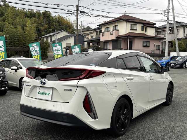 トヨタ プリウス ＰＨＶ A レザーパッケージ 熊本県 2018(平30)年 3.3万km ホワイトパールクリスタルシャイン 純正11.6インチナビ/【フルセグTV/Bluetooth再生/CD/DVD】/バックカメラ/レーダークルーズコントロール/レーンディパーチャーアラート/プリクラッシュセーフティ/クリアランスソナー/ブラインドスポットモニター/パークアシスト/オートハイビーム/LEDオートライト/ビルトインETC/ドライブレコーダー/シートヒーター/ステアリングヒーター/ステアリングスイッチ/取扱説明書/保証書/スペアキー