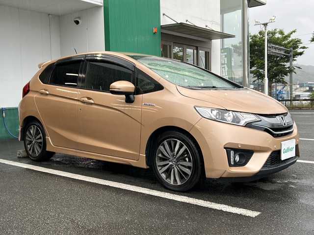 ホンダ フィット ハイブリット Sパッケージ 京都府 2014(平26)年 6.8万km ライトベージュM 〇ワンオーナー/〇スマートキー/〇クルーズコントロール/〇コーナーセンサー/〇バックカメラ/〇衝突軽減ブレーキ/〇プッシュスタート/〇ビルトインETC