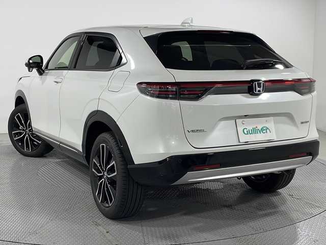 ホンダ ヴェゼル ハイブリッド e:HEV Z 広島県 2025(令7)年 0.1万km未満 プラチナホワイトパール 登録済未使用車（5km）/9型Honda CONNECTディスプレイ/パワーテールゲート/ハーフレザーシート/シートヒーター/ステアリングヒーター/減速セレクター/バックカメラ/ヒルディセントコントロール/ホンダセンシング/・衝突軽減ブレーキ/・誤発進抑制機能/・車線逸脱警報/・車線逸脱抑制/・パーキングセンサー/・アダプティブクルーズコントロール/・アダプティブドライビングビーム/・ブラインドスポットインフォメーション/ETC2.0/ワイヤレス充電/USB入力端子
