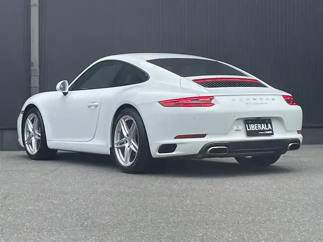 ポルシェ ９１１ カレラ 香川県 2018(平30)年 2.5万km 白 黒革/純正ナビ/パワーシート/シートヒーター/スポーツクロノpkg/スマートキー/電動格納ミラー/オートエアコン/HIDライト/前後コーナーセンサー/純正9インチアルミ/ETC