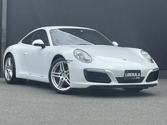 ポルシェ ９１１ カレラ 香川県 2018(平30)年 2.5万km 白 黒革/純正ナビ/パワーシート/シートヒーター/スポーツクロノpkg/スマートキー/電動格納ミラー/オートエアコン/HIDライト/前後コーナーセンサー/純正9インチアルミ/ETC