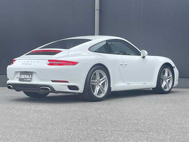 ポルシェ ９１１ カレラ 香川県 2018(平30)年 2.5万km 白 黒革/純正ナビ/パワーシート/シートヒーター/スポーツクロノpkg/スマートキー/電動格納ミラー/オートエアコン/HIDライト/前後コーナーセンサー/純正9インチアルミ/ETC