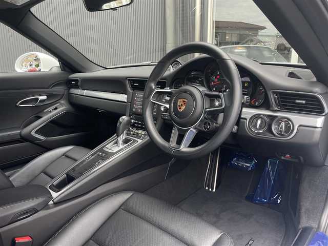 ポルシェ ９１１ カレラ 香川県 2018(平30)年 2.5万km 白 黒革/純正ナビ/パワーシート/シートヒーター/スポーツクロノpkg/スマートキー/電動格納ミラー/オートエアコン/HIDライト/前後コーナーセンサー/純正9インチアルミ/ETC