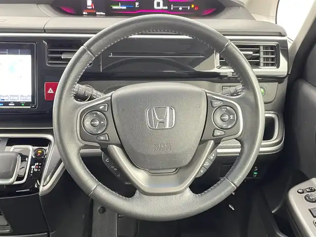 ホンダ ステップワゴン スパーダ eHEV G EXホンダS 千葉県 2020(令2)年 4.5万km プレミアムスパークルブラックパール 純正9インチナビ　VXM-207VFNi/フルセグTV　Bluetooth　CD/DVD/純正10インチフリップダウンモニター/バックカメラ/両側パワースライドドア/ETC2.0ビルトイン/オートライト/ハーフレザー/シートヒーター/ホンダセンシング/・衝突軽減ブレーキ/・レーンキープアシスト/・レーダークルーズコントロール/・誤発進抑制機能/・先行車お知らせ機能/・標識認識機能/コーナーセンサー/クリアランスソナー/パーキングセンサー/ステアリングスイッチ/USB入力/純正アルミホイール/純正フロアマット/わくわくゲート/トリプルゾーンコントロール・フルオートエアコン/スマートキー/プッシュスタート