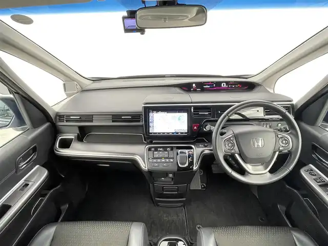 ホンダ ステップワゴン スパーダ eHEV G EXホンダS 千葉県 2020(令2)年 4.5万km プレミアムスパークルブラックパール 純正9インチナビ　VXM-207VFNi/フルセグTV　Bluetooth　CD/DVD/純正10インチフリップダウンモニター/バックカメラ/両側パワースライドドア/ETC2.0ビルトイン/オートライト/ハーフレザー/シートヒーター/ホンダセンシング/・衝突軽減ブレーキ/・レーンキープアシスト/・レーダークルーズコントロール/・誤発進抑制機能/・先行車お知らせ機能/・標識認識機能/コーナーセンサー/クリアランスソナー/パーキングセンサー/ステアリングスイッチ/USB入力/純正アルミホイール/純正フロアマット/わくわくゲート/トリプルゾーンコントロール・フルオートエアコン/スマートキー/プッシュスタート