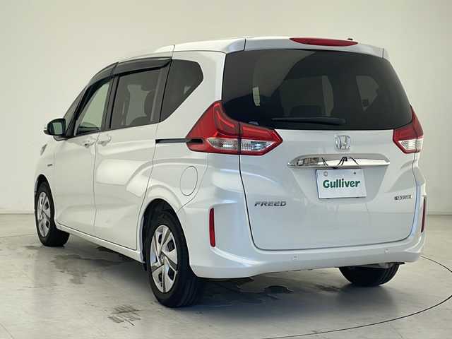 ホンダ フリード ハイブリット G ホンダセンシング 千葉県 2022(令4)年 4万km プラチナホワイトパール 純正メモリーナビ/フルセグTV/Bluetooth/CD/DVD/バックカメラ/ETC/両側パワースライドドア/ワイパーデアイサー/シートヒーター/追従クルーズコントロール/レーンキープアシスト/衝突軽減ブレーキ/ステアリングリモコン/ＬＥＤヘッドライト