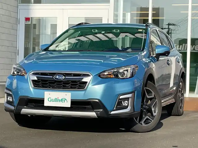 スバル ＸＶ ハイブリッド アドバンス 道央・札幌 2018(平30)年 4.2万km ラグーンブルーP ・４WD/・衝突軽減ブレーキ/・ハーフレザーシート/・純正SDナビ/　CD＆DVD＆USB＆SD＆ラジオ＆BT/・フルセグTV（走行中視聴不可）/・バックカメラ/・サイドカメラ/・パドルシフト/・オートエアコン/・オートライト/・アイドリングストップ/・ダウンヒルアシストコントロール/・レーンキープアシスト/・プッシュスタート/・スマートキー/・LEDライト/・ステアリング連動ヘッドランプ/・純正フロアマット/・フォグライト/・ウィンカーミラー/・ETC