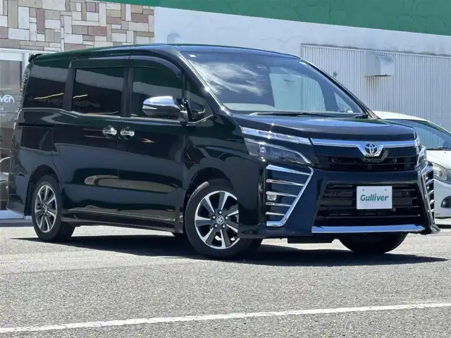 トヨタ ヴォクシー ZS 煌Ⅲ 徳島県 2021(令3)年 3.9万km イナズマスパーキングブラックガラスフレーク ディーラーop10インチナビ/（バックカメラ/フルセグTV/CD/DVD）/純正12インチフリップダウンモニター/両側パワースライドドア/クルーズコントロール/LDA/PKSB/クリアランスソナー/LEDヘッドライト/オートライト/純正16AW/純正フロアマット/ETC2.0/スペアキー