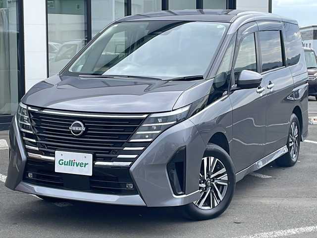 日産 セレナ ハイウェイスター V 岩手県 2023(令5)年 1.5万km ダークメタルグレー 禁煙車/・4WD/・純正12.3インチナビ/（Bluetooth・フルセグ・ラジオ・USB・applecarplay・androidauto）/・全方位カメラ/・社外14.1インチフリップダウンモニター/・プロパイロット/・ビルトインETC2.0/・純正前後ドライブレコーダー/・ハンズフリー両側パワースライドドア/・横滑り防止装置/・衝突被害軽減システム/・置くだけ充電/・ステアリングヒーター/・デジタルインナーミラー/・前席・中席シートヒーター/・ブラインドスポットモニター/・パドルシフト/・ステアリングスイッチ/・前後コーナーセンサー/・純正フロアマット/・ドアバイザー/・LEDヘッドライト/・スマートキー/・プッシュスタート/・アイドリングストップ/・純正16インチアルミホイール/・保証書