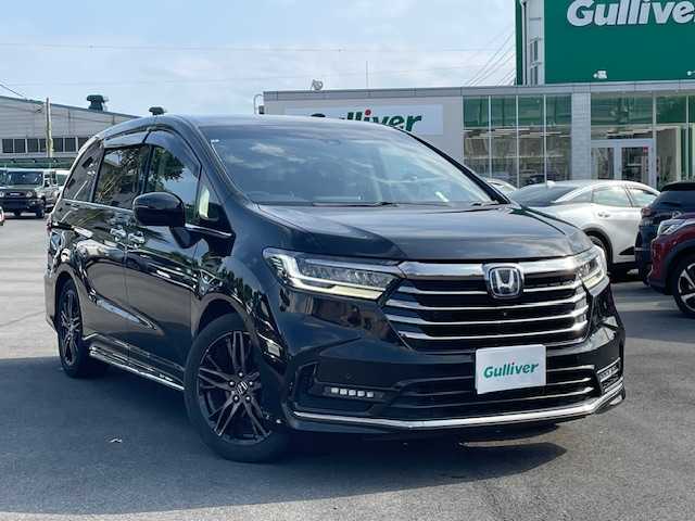 ホンダ オデッセイ ハイブリッド e:HEVアブソルート EX 静岡県 2021(令3)年 4.5万km プレミアムスパークルブラックパール ●純正10インチナビ/(フルセグ/CD/DVD/Bluetooth)/(ギャザズ/VXU-217DYi)/●前席パワーシート/●前席シートヒーター/●全方位カメラ/●レーダークルーズコントロール/●11.6インチフリップダウンモニター/●ブラインドスポットモニター/●衝突被害軽減システム/●レーンキープアシスト/●前後コーナーセンサー/●電動パーキングブレーキ/●オートブレーキホールド/●LEDヘットライト＆フォグランプ/●オートライト/●革巻きステアリング/●ステアリングスイッチ/●ETC2.0/●前後ドライブレコーダー/●両側パワースライドドア/●オットマン/●スマートキー/●プッシュスタート/●ドアバイザー/●純正フロアマット/●純正18インチアルミホイール/●W＋サイド＆カーテンSRS＋ABS