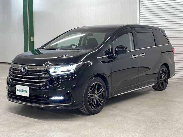 ホンダ オデッセイ ハイブリッド e:HEVアブソルート EX 熊本県 2021(令3)年 4.6万km プレミアムスパークルブラックパール 純正10インチナビ/(フルセグ/CD/DVD/Bluetooth)/(ギャザズ/VXU-217DYi)/前席パワーシート/前席シートヒーター/全方位カメラ/レーダークルーズコントロール/11.6インチフリップダウンモニター/ブラインドスポットモニター/衝突被害軽減システム/レーンキープアシスト/前後コーナーセンサー/電動パーキングブレーキ/オートブレーキホールド/LEDヘットライト＆フォグランプ/オートライト/革巻きステアリング/ステアリングスイッチ/ETC2.0/前後ドライブレコーダー/両側パワースライドドア/オットマン/スマートキー/プッシュスタート/ドアバイザー/純正フロアマット/純正18インチアルミホイール/W＋サイド＆カーテンSRS＋ABS