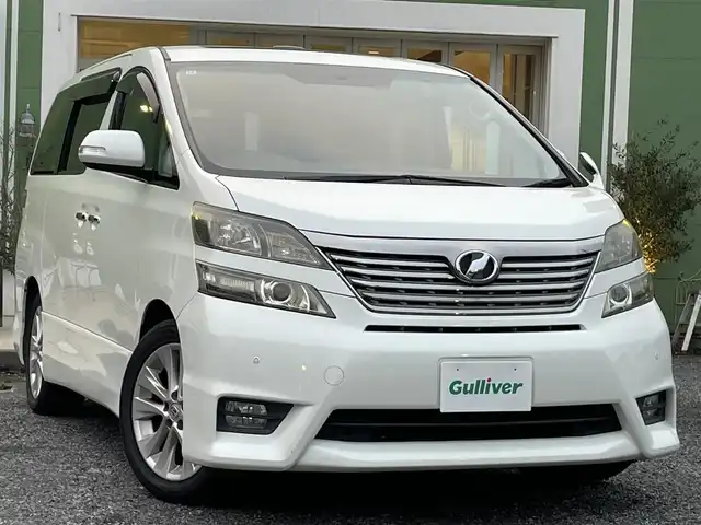 トヨタ ヴェルファイア 2．4Z プラチナセレクション 埼玉県 2009(平21)年 6.5万km パール 純正ナビTV/社外フリップダウンモニター/プッシュスタート/両側パワースライドドア/パワーバックドア/２列目オットマン/純正18インチAW/HIDヘッドライト/オートライト/前方ドライブレコーダー/ビルトインETC/取扱説明書/保証書付整備手帳