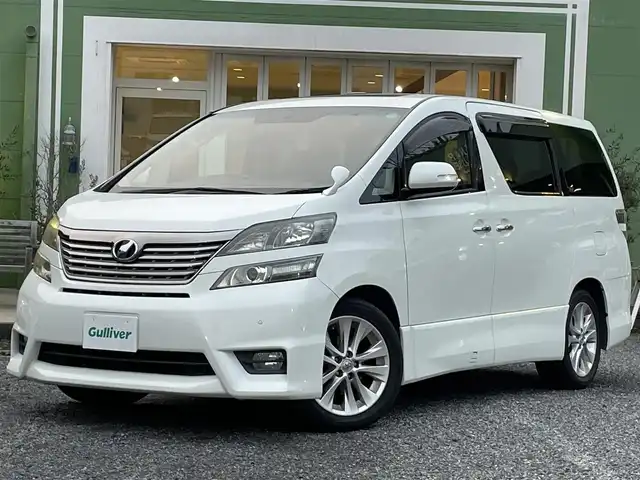 トヨタ ヴェルファイア 2．4Z プラチナセレクション 埼玉県 2009(平21)年 6.5万km パール 純正ナビTV/社外フリップダウンモニター/プッシュスタート/両側パワースライドドア/パワーバックドア/２列目オットマン/純正18インチAW/HIDヘッドライト/オートライト/前方ドライブレコーダー/ビルトインETC/取扱説明書/保証書付整備手帳