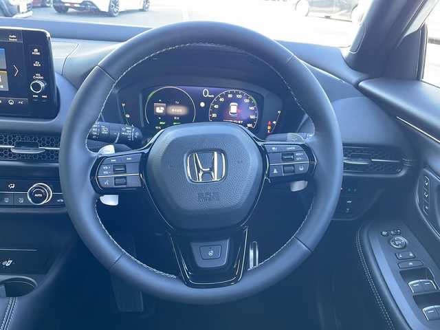 ホンダ ＺＲ－Ｖ ハイブリッド e:HEV Z ブラックスタイル 三重県 2025(令7)年 0.1千km プラチナホワイトパール 登録済未使用車/純正メーカーオプションナビ/AppleCarPlay/AndroidAuto/全周囲カメラ/ワイヤレス充電/ＢＳＭ/本革シート/全席シートヒーター/ステアリングヒーター/パワーシート/メモリーシート/追従クルーズコントロール/レーンキープアシスト/コーナーセンサー/パドルシフト/ステアリングスイッチ/電動リアゲート/スペアキー/SOSコール/先行車発進告知/標識認識システム/衝突被害軽減システム/電子パーキング/LEDライト/オートライト/オートマチックハイビーム/電動格納ミラー/禁煙車