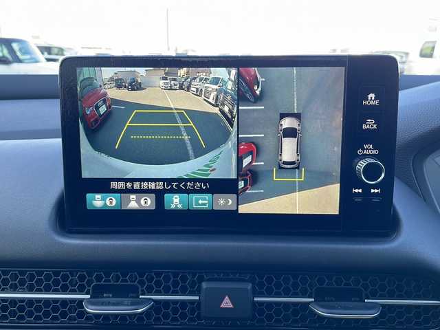 ホンダ ＺＲ－Ｖ ハイブリッド e:HEV Z ブラックスタイル 三重県 2025(令7)年 0.1千km プラチナホワイトパール 登録済未使用車/純正メーカーオプションナビ/AppleCarPlay/AndroidAuto/全周囲カメラ/ワイヤレス充電/ＢＳＭ/本革シート/全席シートヒーター/ステアリングヒーター/パワーシート/メモリーシート/追従クルーズコントロール/レーンキープアシスト/コーナーセンサー/パドルシフト/ステアリングスイッチ/電動リアゲート/スペアキー/SOSコール/先行車発進告知/標識認識システム/衝突被害軽減システム/電子パーキング/LEDライト/オートライト/オートマチックハイビーム/電動格納ミラー/禁煙車