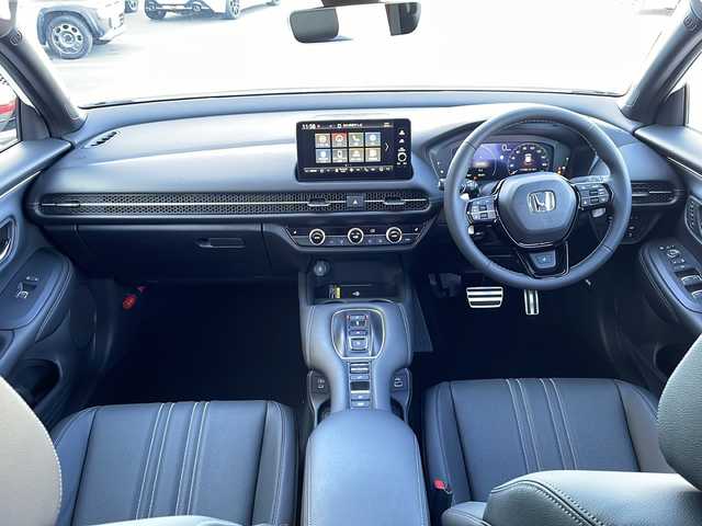 ホンダ ＺＲ－Ｖ ハイブリッド e:HEV Z ブラックスタイル 三重県 2025(令7)年 0.1千km プラチナホワイトパール 登録済未使用車/純正メーカーオプションナビ/AppleCarPlay/AndroidAuto/全周囲カメラ/ワイヤレス充電/ＢＳＭ/本革シート/全席シートヒーター/ステアリングヒーター/パワーシート/メモリーシート/追従クルーズコントロール/レーンキープアシスト/コーナーセンサー/パドルシフト/ステアリングスイッチ/電動リアゲート/スペアキー/SOSコール/先行車発進告知/標識認識システム/衝突被害軽減システム/電子パーキング/LEDライト/オートライト/オートマチックハイビーム/電動格納ミラー/禁煙車