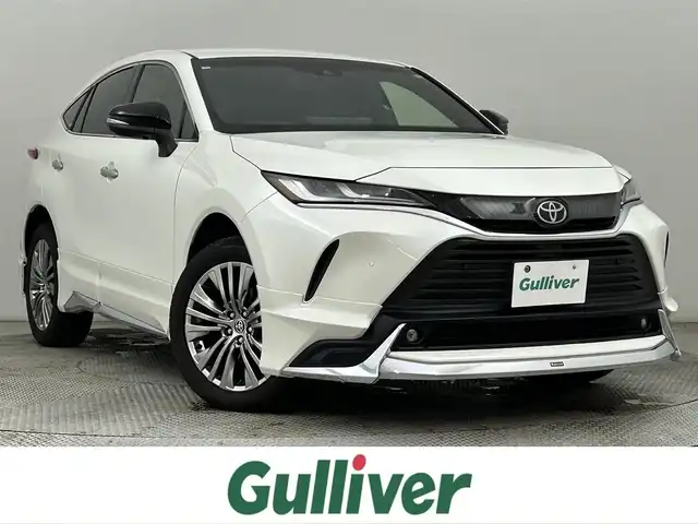トヨタ ハリアー Z 道央・札幌 2022(令4)年 6.8万km ホワイトパールクリスタルシャイン ・4WD/・モデリスタエアロ（F.S.R）/・純正メモリインチナビ/USB/AUX/BT/フルセグ/・JBLサウンド/・バックカメラ/・ビルドインETC2.0/・前後ドライブレコーダー/・デジタルインナーミラー/・衝突軽減ブレーキ/・前後コーナーセンサー/・ブラインドスポットモニター/・ヘッドアップディスプレイ/・クルーズコントロール/・リヤクロストラフィックアラート/・オートブレーキホールド/・電動パーキングブレーキ/・SOSコール/・LEDライト/・オートライト/・オートマチックハイビーム/・フォグランプ/・ハーフレザーシート/・D席パワーシート/・プッシュスタート/・スマートキー/・スペアキー/・純正フロアマット/・保証書/取扱説明書