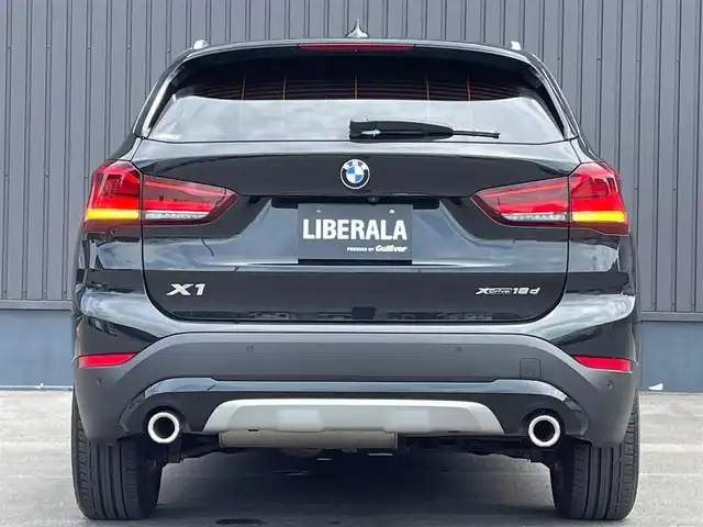 ＢＭＷ Ｘ１ xDrive 18d xライン 青森県 2020(令2)年 3.6万km 黒 /4WD/ディーゼルターボ/レーン・ディパーチャー・ウォーニング/（車線逸脱警告システム）/前車接近警告機能/衝突回避、被害軽減ブレーキ/パークディスタンスコントロール/HDDナビゲーションシステム/　(Bluetooth/USB)/ハイラインパッケージ/　(フロントシートヒーティング)/コンフォートパッケージ/　(オートマチックテールゲート//　電動フロントシート)/ＬＥＤヘッドライト/ミラー一体ＥＴＣ　/前後ドラレコ　/前後コーナーセンサー　/革巻きステア/オーディオ/ステアスイッチ/オートライト/オートワイパー/ヘットライトリベライザー/シルバールーフレール/ヒルクライムアシスト/リア7面スモークフィルム/木目調パネル/W/サイド/カーテンエアバッグ /ABS/スマートキー/保証書/取説