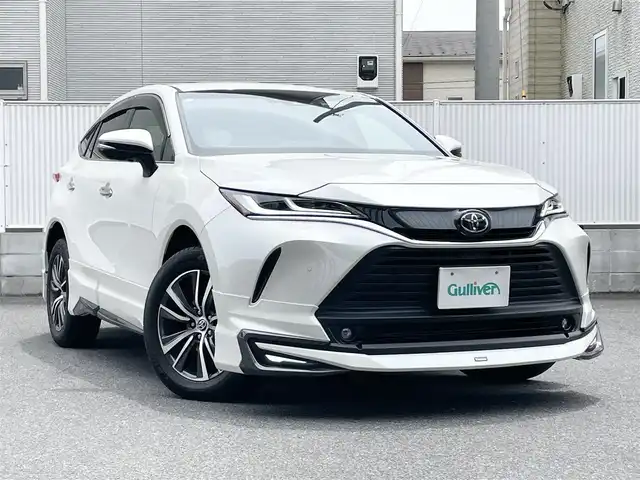 トヨタ ハリアー G 栃木県 2021(令3)年 1.9万km ホワイトパールクリスタルシャイン 純正ナビ（BT/Miracast/フルセグTV/USB）/モデリスタフルエアロ/クルーズコントロール/デジタルインナーミラー/パワーバックドア/パワーシート/純正ドライブレコーダー/バックカメラ/ドアバイザー/ETC/オートチルト＆テレスコピックステアリング/オートハイビーム/保証書/取説/スペアキー