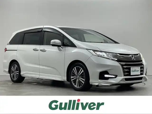 ホンダ オデッセイ アブソルート ホンダセンシング 埼玉県 2017(平29)年 1.4万km プラチナホワイトパール 純正９インチナビ　純正フリップダウンモニター　バックカメラ　両側パワースライドドア　ホンダセンシング　ビルトインＥＴＣ２．０　アダクティブクルーズコントロール　ドラレコ　純正アルミ　ＬＥＤライト　ＴＶ