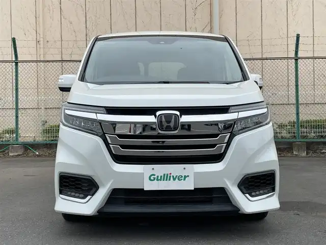 ホンダ ステップワゴン スパーダ ハイブリッド G EX ホンダセンシング 東京都 2017(平29)年 6.7万km プラチナホワイトパール カロッツェリアナビ/後席モニター/衝突軽減ブレーキ/路外逸脱抑制機能/車線維持支援/クルーズコントロール/シートヒーター/両側電動スライドドア/ＥＴＣ/ＥＣＯＮモード/ステアリングスイッチ