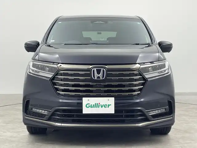 ホンダ オデッセイ ハイブリッド e:HEVアブソルート EXブラックED 三重県 2023(令5)年 0.5万km プレミアムヴィーナスブラックP Gathers11.4インチホンダコネクトナビ（LXM-247VFLi）/・フルセグ・CD・DVD・Bluetooth・SD・USB・HDMI/マルチビューカメラシステム/フリップダウンモニター/オットマン/ホンダセンシング/・衝突軽減ブレーキ/・アダプティブクルーズコントロール/・オートハイビーム/・ブラインドスポットインフォメーション/・車線維持支援システム/・踏み間違い衝突軽減システム/両側パワースライドドア/パワーバックドア/ハンズフリーアクセスパワーテールゲート/1列目・2列目シートヒーター/本革シート/トリプルゾーンコントロール・フルオートエアコンディショナー/ワイヤレス充電器/ビルトインETC/前後ドライブレコーダー/電子制御パーキングブレーキ