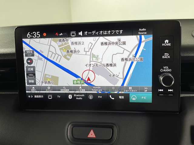 ホンダ ヴェゼル ハイブリッド e:HEV Z 福岡県 2025(令7)年 0.1万km未満 プラチナホワイトパール 純正9インチナビ（フルセグ・BT）/・バックカメラ/・レーダークルーズコントロール/・レーンキープアシスト/・衝突軽減ブレーキ/・路外逸脱抑制機能/・先行車発進お知らせ機能/・標識認識機能/・オートハイビーム/・パーキングセンサーシステム/・誤発進抑制機能/・後方誤発進抑制機能/・トラフィックジャムアシスト/・ハーフレザー/・シートヒーター/・ステアリングヒーター/・ワイヤレス充電/・パワーバックドア/・パドルシフト/・LEDオートライト/・ビルトインETC