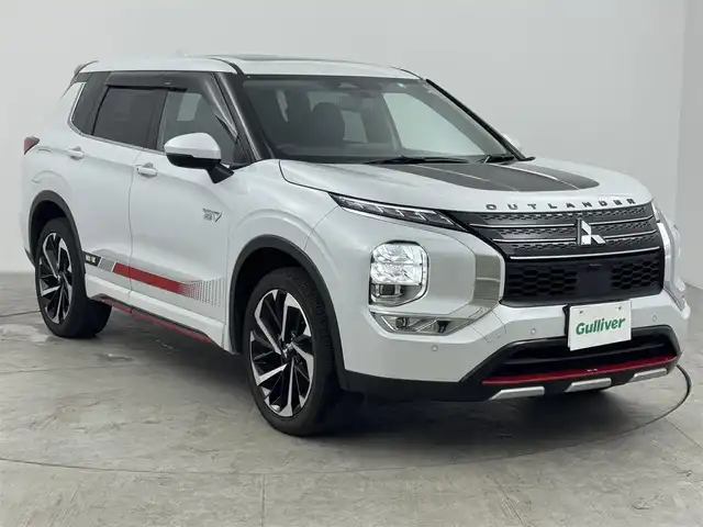 三菱 アウトランダー ＰＨＥＶ G 愛知県 2022(令4)年 3.8万km ホワイトダイヤモンド ４WD/サンルーフ/ＲＡＬＬＩＡＲＴアクセサリー/・フロントスキッドガーニッシュ/・サイドアンダーガーニッシュ/・リヤバンパーガーニッシュ/・テールゲートスポイラー/・サイドデカール/AC100V /純正ナビ/・Bluetooth/・フルセグTV/全方位カメラ/ハーフレザーシート/前席シートヒーター/ステアリングヒーター/D席パワーシート/電動リアゲート/衝突軽減システム/ブラインドスポットモニター/レーンアシスト/パワーモード/エコモード/ターマックモード/グラベルモード/スノーモード/マッドモード/純正20インチAW/純正LEDヘッドライト
