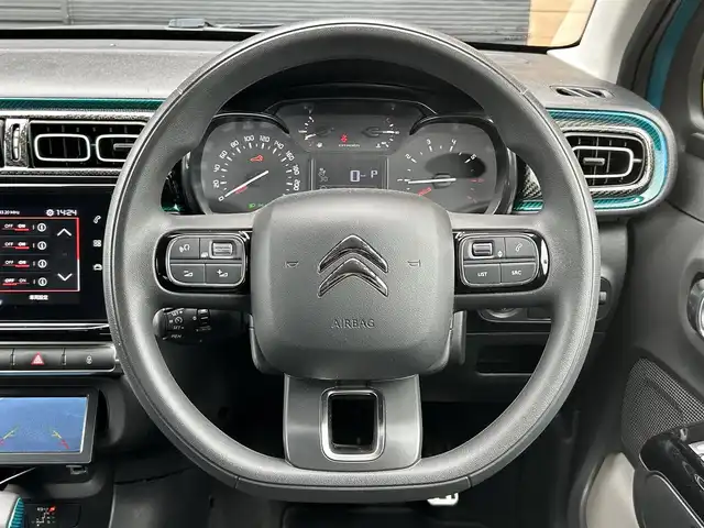 シトロエン シトロエン Ｃ３ フィール 宮崎県 2021(令3)年 1.4万km 青 純正ディスプレイオーディオ/・Bluetooth/・Apple CarPlay/・Android Auto/・AM FM/・USB/社外バックカメラモニター/ETC/リアコーナーセンサー/純正１６インチアルミホイール/トラクションコントロール/クルーズコントロール/・レーンデパーチャーウォーニング/LEDヘッドライト/・オートライト/・オートハイビーム