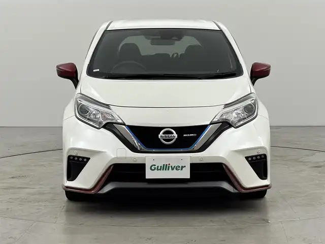日産 ノート e－パワー ニスモ 福岡県 2019(令1)年 5.3万km ブリリアントホワイトパール 純正ナビ　/バックカメラ　/衝突軽減システム　/レーンアシスト　/コーナーセンサー　/オートライト　/フォグランプ　/ＥＴＣ　/ＬＥＤライト　/純正１６インチアルミホイール　/純正フロアマット　/ＡＢＳ　/プッシュスタート