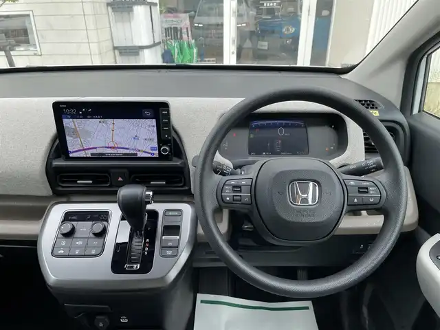 ホンダ フリード AIR 石川県 2024(令6)年 0.9万km パール 純正9型ナビ/フルセグTV/バックカメラ/LEDヘッドライト/両側パワースライドドア/ETC/ホンダセンシング/レーダークルーズ/ドライブレコーダー/スマートキー/プッシュスタート/電動ミラー/保証書