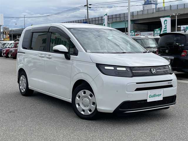 ホンダ フリード AIR 山形県 2024(令6)年 0.9万km パール 純正9型ナビ/フルセグTV/バックカメラ/LEDヘッドライト/両側パワースライドドア/ETC/ホンダセンシング/レーダークルーズ/ドライブレコーダー/スマートキー/プッシュスタート/電動ミラー/保証書