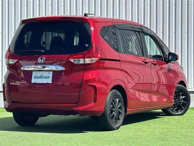 ホンダ フリード G 香川県 2023(令5)年 3.7万km プレミアムクリスタルレッドM 社外９型ナビ　/【CD/DVD/SD/Bluetooth】/地デジ対応TV/バックカメラ/両側電動スライド　/ホンダセンシング　/レーダークルーズコントロール　/ＡＣＣ先行車検知システム　/標識認識機能　/レーンキープアシスト　/社外デジタルインナーミラー　/SDなし/ＬＥＤヘッドライト/オートライト機能/リアロールサンシェード/ウィンカーミラー/ビルトインETC