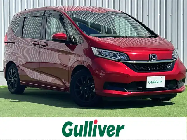 ホンダ フリード G 香川県 2023(令5)年 3.7万km プレミアムクリスタルレッドM 社外９型ナビ　/【CD/DVD/SD/Bluetooth】/地デジ対応TV/バックカメラ/両側電動スライド　/ホンダセンシング　/レーダークルーズコントロール　/ＡＣＣ先行車検知システム　/標識認識機能　/レーンキープアシスト　/社外デジタルインナーミラー　/SDなし/ＬＥＤヘッドライト/オートライト機能/リアロールサンシェード/ウィンカーミラー/ビルトインETC