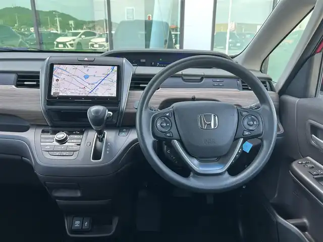 ホンダ フリード G 香川県 2023(令5)年 3.7万km プレミアムクリスタルレッドM 社外９型ナビ　/【CD/DVD/SD/Bluetooth】/地デジ対応TV/バックカメラ/両側電動スライド　/ホンダセンシング　/レーダークルーズコントロール　/ＡＣＣ先行車検知システム　/標識認識機能　/レーンキープアシスト　/社外デジタルインナーミラー　/SDなし/ＬＥＤヘッドライト/オートライト機能/リアロールサンシェード/ウィンカーミラー/ビルトインETC