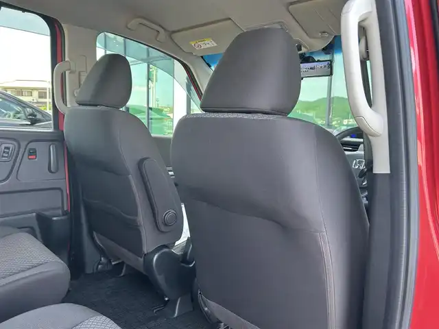 ホンダ フリード G 香川県 2023(令5)年 3.7万km プレミアムクリスタルレッドM 社外９型ナビ　/【CD/DVD/SD/Bluetooth】/地デジ対応TV/バックカメラ/両側電動スライド　/ホンダセンシング　/レーダークルーズコントロール　/ＡＣＣ先行車検知システム　/標識認識機能　/レーンキープアシスト　/社外デジタルインナーミラー　/SDなし/ＬＥＤヘッドライト/オートライト機能/リアロールサンシェード/ウィンカーミラー/ビルトインETC