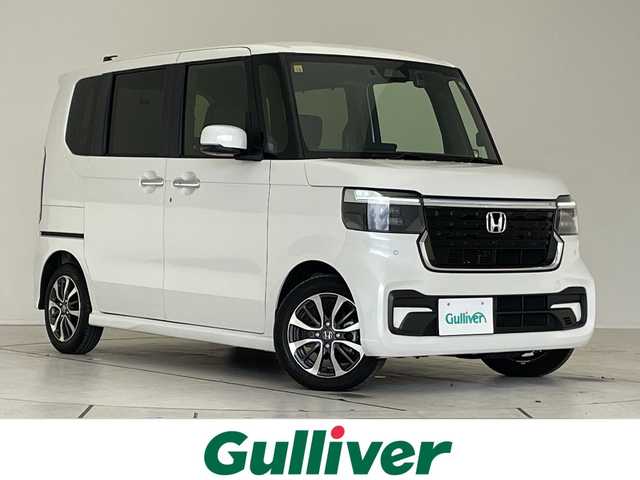 ホンダ Ｎ ＢＯＸ カスタム 愛知県 2023(令5)年 1.2万km プラチナホワイトパール 純正9型ディズプレイオーディオナビ/全方位カメラ/両側パワースライドドア/レーダークルーズコントロール/シートヒーター/バックカメラ/コーナーセンサー/純正アルミホイール/LEDヘッドライト/オートマチックハイビーム/ドライブレコーダー/ETC/衝突軽減システム/フルセグ/CD DVD/Bluetooth/ステアリングスイッチ/スマートキー/プッシュスタート