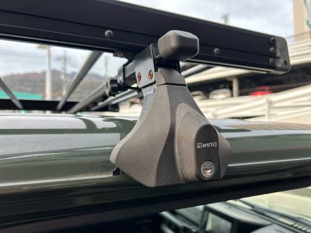 スズキ ジムニー XL 広島県 2019(平31)年 3.8万km ジャングルグリーン 禁煙/純正ディスプレイオーディオ（PVH-9300DVSZS）/・Bluetooth/CD/DVD/スマホ連携/カロッツェリアツイーター/DAMDフロントバンパー/モンスタースポーツリフトアップ/モンスタースポーツサスペンション/ルーフラック/D席BRIDEシート純正シート車載/純正ドアバイザー/電動格納ミラー/タイヤ：オープンカントリー