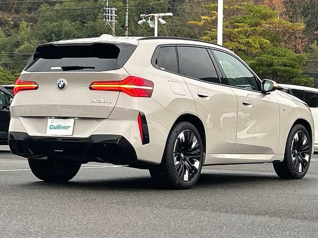 ＢＭＷ ＢＭＷ Ｘ３ 20d xDrive Mスポーツ 佐賀県 2024(令6)年 0.8万km ベージュ 純正14.9インチコントロールディスプレイ/Harman/Kardon/ETC/サラウンドビューカメラシステム/純正20インチアルミホイール/アクティブ・クルーズ・コントロール/ルーフレール/ヘッドアップディスプレイ/パドルシフト/ワイヤレス充電器/パワーバックドア/純正ドライブレコーダー前後/ステアリングヒーター/前席エアシート/全席シートヒーター/前席パワーシート/前席メモリーシート/レザーシート/ブラインドスポットモニター/LEDヘッドライト/スマートキー/スペアキー×１