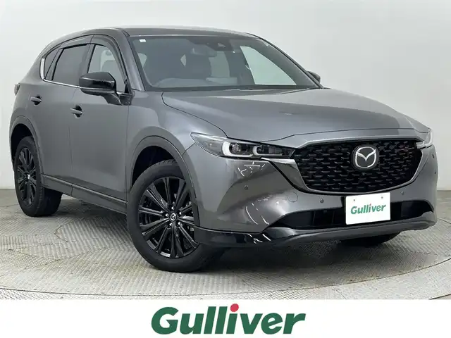 マツダ ＣＸ－５ 25S スポーツアピアランス 道央・札幌 2023(令5)年 0.4万km マシーングレープレミアムM ・４WD/・純正ディスプレイオーディオ/・BT/USB・フルセグ/・360°ビューモニター/・ETC/・純正　前後ドライブレコーダー/・i-ACTIVSENSE/・アドバンスト・スマート・シティ・ブレーキ・サポート/・レーンキープアシスト/・レーダークルーズコントロール/・クリアランスソナー/・横滑り防止装置/・ブラインドスポットモニタリング/・ハイビーム・コントロール・システム/・アダプティブ・フロントライティング・システム/・LEDヘッドライト/・オートライト/・アイドリングストップ/・ヘッドアップディスプレイ/・パワーバックドア/・レザーシート/・前席シートヒーター/・D+N席パワーシート/・ステアリングヒーター/・置くだけ充電/・純正19インチAW/・純正フロアマット/・プッシュスタート/・スマートキー/・スペアキー/・保証書