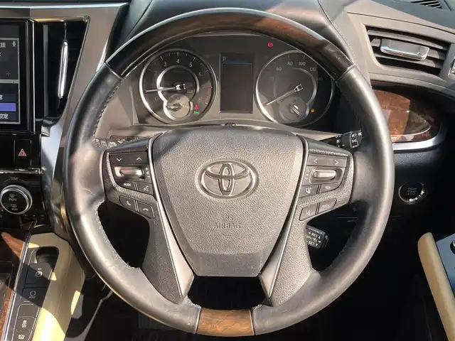 トヨタ ヴェルファイア V 愛媛県 2019(令1)年 5.3万km ホワイトパールクリスタルシャイン 禁煙車/登録時走行距離：52224km/ディーラーオプション純正10インチナビ/CD/DVD/フルセグTV/Bluetooth/バックカメラ/３６０°ドライブレコーダー/デジタルインナーミラー/ビルトインETC/純正12.1インチフリップダウンモニター(リモコン有)/サンルーフ/衝突被害軽減システム/クリアランスソナー/横滑り防止装置/レーンキープアシスト/レーダークルーズコントロール/LEDヘッドライト/フォグランプ/オートライト/オートマチックハイビーム/レザーシート/運転席パワーシート/オットマン/両側パワースライドドア/エンジンスタートボタン/スマートキー/純正フロアマット/純正１７インチアルミホイール