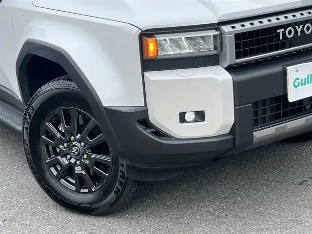 トヨタ ランドクルーザー ２５０ VX 京都府 2024(令6)年 1.5万km プラチナホワイトパールマイカ ワンオーナー/登録時走行距離14903Km/ムーンルーフ/セーフティセンス/・プリクラッシュセーフティ/・レーンデパーチャーアラート/・オートマチックハイビーム/・レーントレーシングアシスト/・レーダークルーズコントロール/・ロードサインアシスト/・発信遅れ通知機能/純正12.3インチディスプレイ/・ナビ/・フルセグTV/・USB入力/・BT接続/パノラミックビューモニター/デジタルインナーミラー/・前方ドラレコ機能/2.0ETC/パーキングサポートブレーキ/ブラインドスポットモニター/レザーシート/・運転席パワーシート/・前席シートベンチレーション/・前席シートヒーター/左右後席独立調整式オートエアコン/レザーステアリング/・ステアリモコン/・ステアヒーター/パワーバックドア/ルーフレール/3眼LEDヘッドライト/・LEDフォグランプ/純正18インチアルミホイール/純正ドアバイザー/純正フロアゴムマット/プッッシュスタート/スマートキー×2個/車両保証書
