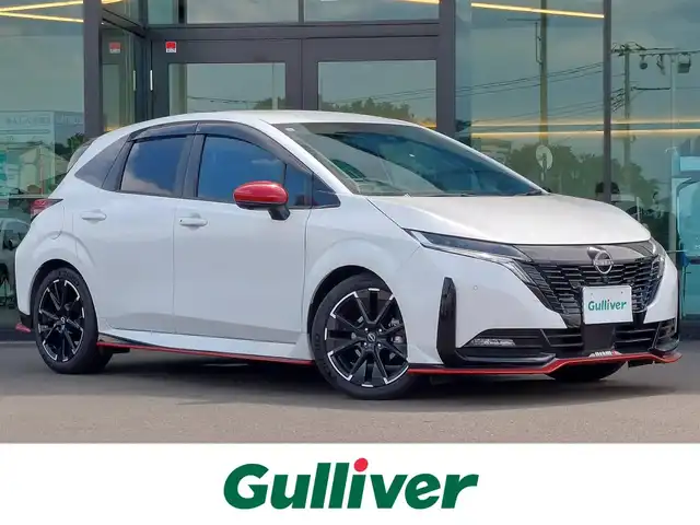 日産 オーラ ニスモ 東京都 2023(令5)年 1.7万km ピュアホワイトパール 純正9インチナビ/アラウンドビューモニター/プロパイロット/デジタルインナーミラー/ビルトインETC2.0/ワイヤレス充電/ハーフレザーシート/シートヒーター/ステアリングヒーター/レーダークルーズコントロール/衝突軽減ブレーキ/レーンキープアシスト/ブラインドスポットモニター/コーナーセンサー