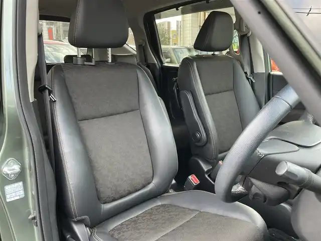 ホンダ フリード＋ ハイブリット クロスター 大分県 2023(令5)年 2.8万km シルバーミストグリーンM ワンオーナー/ハーフレザー調シート/純正メモリナビ VXM-237VFNi/【フルセグ/DVD/BTオーディオ】/バックカメラ/後席フリップダウンモニター/両側パワースライドドア/純正15インチアルミホイール/レーダークルーズコントロール/衝突被害軽減システム/レーンアシスト/ETC/LEDヘッドライト/LEDフォグランプ/オートライト/レザーステアリング/チルトステアリング/ステアリングリモコン/運転席シートリフター/前席シートヒーター/ミラーヒーター/ワイパーヒーター/ウインカーミラー/横滑り防止装置/エンジンプッシュスタート/リアプライバシーガラス/ドアバイザー/フロアマット/電動格納ミラー/カーテン＆サイド＆Wエアバッグ/ABS/スマートキー×2/保証書/車両取説/ナビ取説