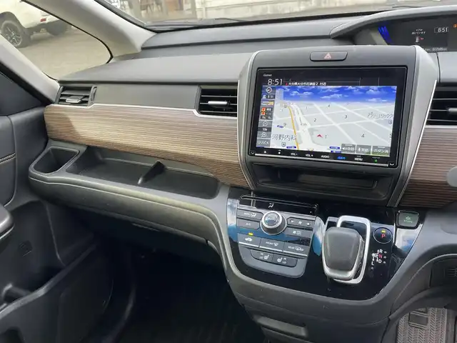 ホンダ フリード＋ ハイブリット クロスター 大分県 2023(令5)年 2.8万km シルバーミストグリーンM ワンオーナー/ハーフレザー調シート/純正メモリナビ VXM-237VFNi/【フルセグ/DVD/BTオーディオ】/バックカメラ/後席フリップダウンモニター/両側パワースライドドア/純正15インチアルミホイール/レーダークルーズコントロール/衝突被害軽減システム/レーンアシスト/ETC/LEDヘッドライト/LEDフォグランプ/オートライト/レザーステアリング/チルトステアリング/ステアリングリモコン/運転席シートリフター/前席シートヒーター/ミラーヒーター/ワイパーヒーター/ウインカーミラー/横滑り防止装置/エンジンプッシュスタート/リアプライバシーガラス/ドアバイザー/フロアマット/電動格納ミラー/カーテン＆サイド＆Wエアバッグ/ABS/スマートキー×2/保証書/車両取説/ナビ取説